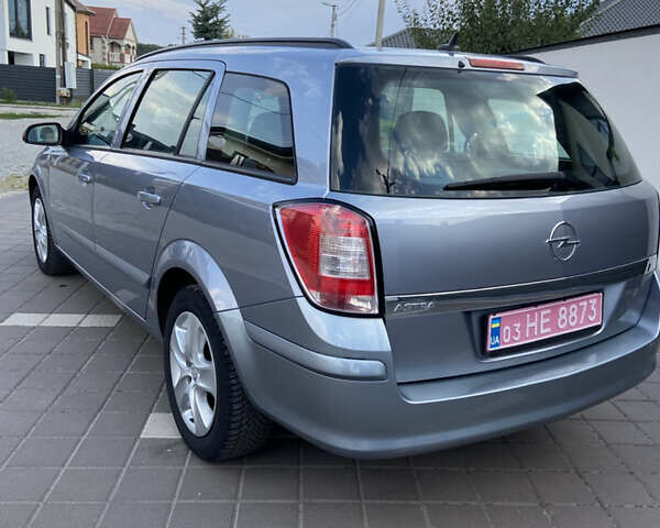 Серый Опель Астра, объемом двигателя 1.6 л и пробегом 214 тыс. км за 5700 $, фото 2 на Automoto.ua