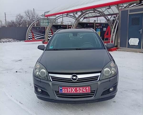 Серый Опель Астра, объемом двигателя 1.6 л и пробегом 190 тыс. км за 5600 $, фото 2 на Automoto.ua