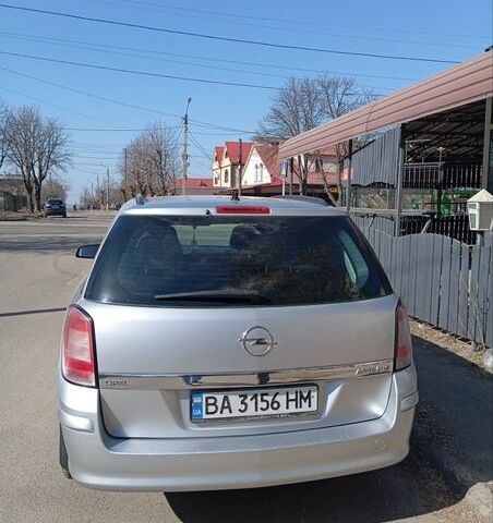 Серый Опель Астра, объемом двигателя 1.6 л и пробегом 240 тыс. км за 4999 $, фото 6 на Automoto.ua