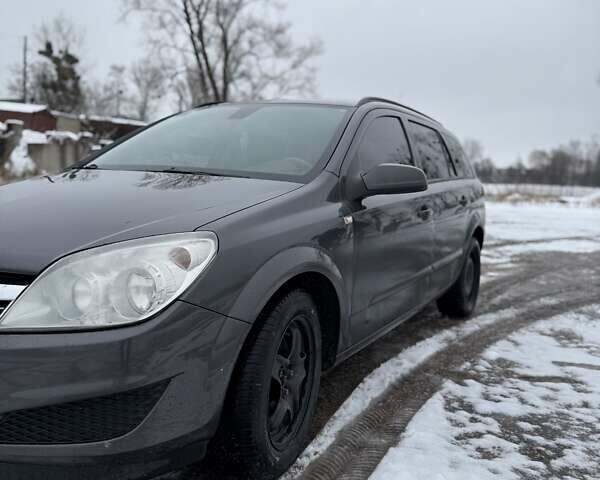 Серый Опель Астра, объемом двигателя 1.7 л и пробегом 323 тыс. км за 5200 $, фото 6 на Automoto.ua