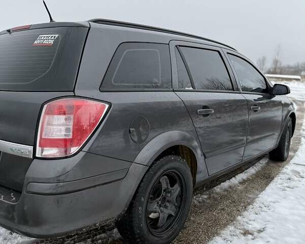 Серый Опель Астра, объемом двигателя 1.7 л и пробегом 323 тыс. км за 5200 $, фото 3 на Automoto.ua