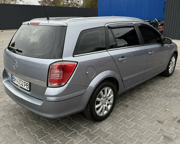 Серый Опель Астра, объемом двигателя 1.6 л и пробегом 289 тыс. км за 4200 $, фото 23 на Automoto.ua