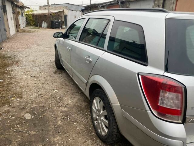 Серый Опель Астра, объемом двигателя 1.6 л и пробегом 230 тыс. км за 5200 $, фото 4 на Automoto.ua