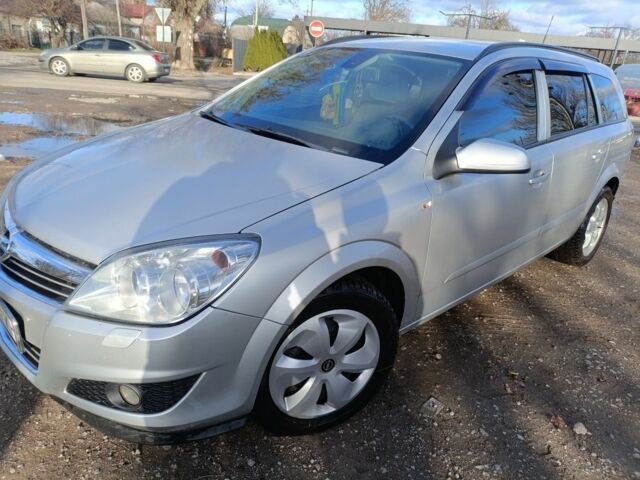 Серый Опель Астра, объемом двигателя 1.2 л и пробегом 210 тыс. км за 5600 $, фото 2 на Automoto.ua