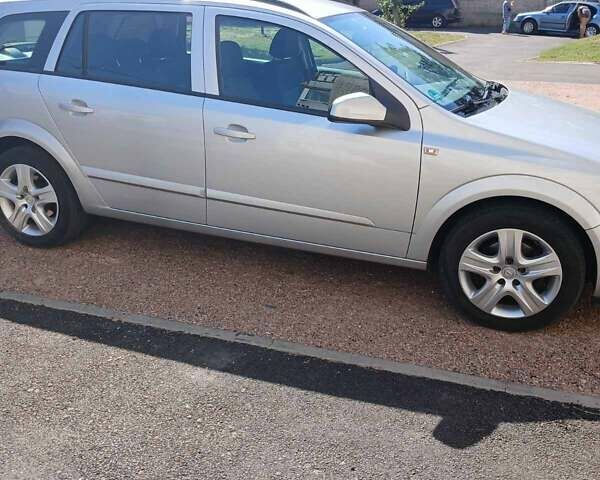 Серый Опель Астра, объемом двигателя 1.6 л и пробегом 245 тыс. км за 5500 $, фото 4 на Automoto.ua