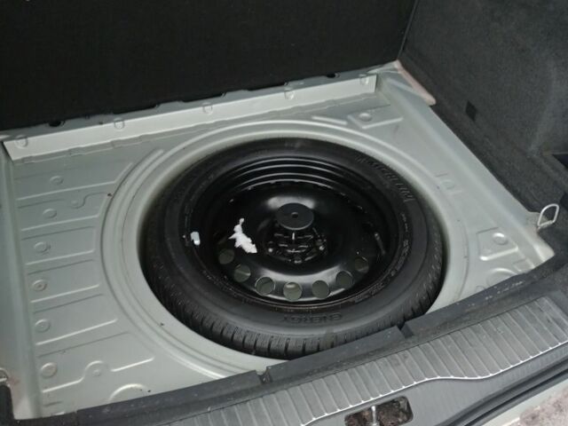 Серый Опель Астра, объемом двигателя 1.4 л и пробегом 240 тыс. км за 5000 $, фото 7 на Automoto.ua