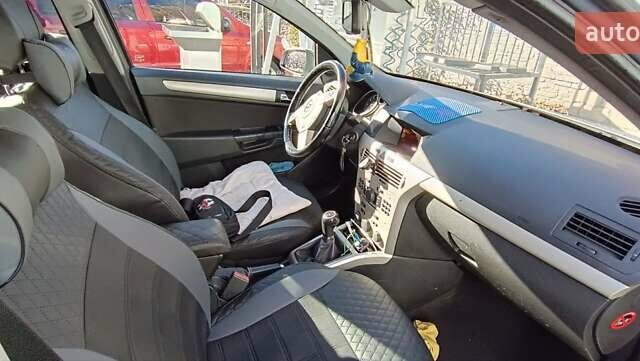 Серый Опель Астра, объемом двигателя 1.6 л и пробегом 140 тыс. км за 7900 $, фото 12 на Automoto.ua