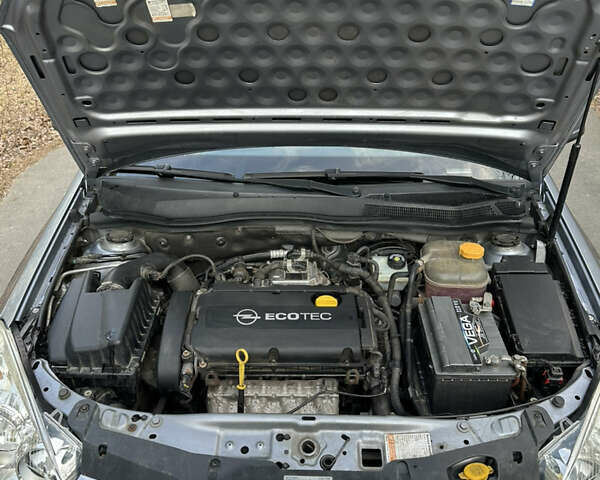 Серый Опель Астра, объемом двигателя 1.6 л и пробегом 216 тыс. км за 5600 $, фото 18 на Automoto.ua