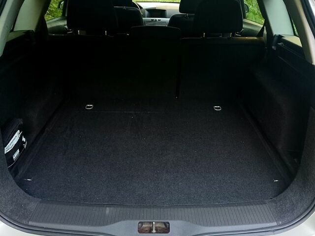 Серый Опель Астра, объемом двигателя 1.4 л и пробегом 113 тыс. км за 5350 $, фото 5 на Automoto.ua