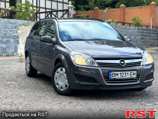 Серый Опель Астра, объемом двигателя 1.6 л и пробегом 253 тыс. км за 5800 $, фото 6 на Automoto.ua