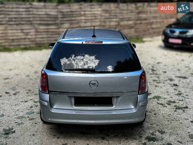 Серый Опель Астра, объемом двигателя 1.6 л и пробегом 210 тыс. км за 5500 $, фото 19 на Automoto.ua