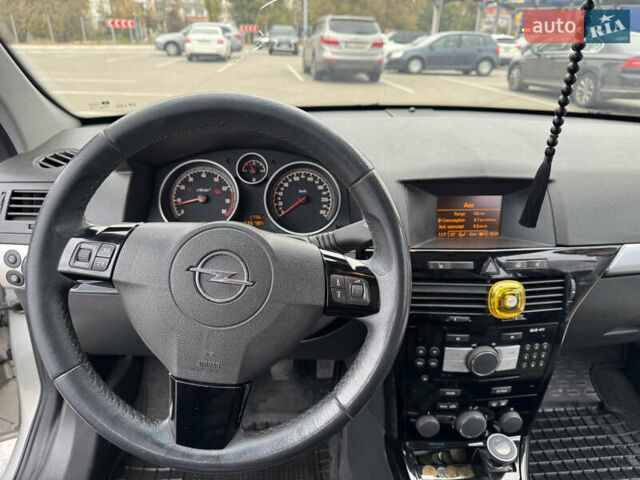 Серый Опель Астра, объемом двигателя 1.8 л и пробегом 237 тыс. км за 6200 $, фото 11 на Automoto.ua