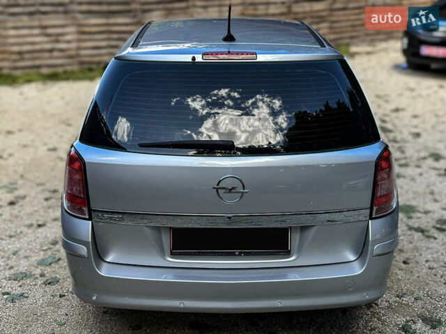 Серый Опель Астра, объемом двигателя 1.6 л и пробегом 210 тыс. км за 5500 $, фото 37 на Automoto.ua