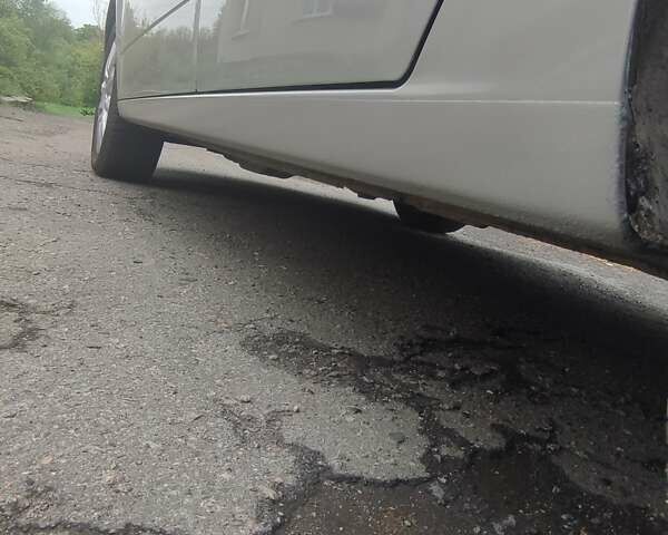 Серый Опель Астра, объемом двигателя 1.6 л и пробегом 199 тыс. км за 5650 $, фото 11 на Automoto.ua