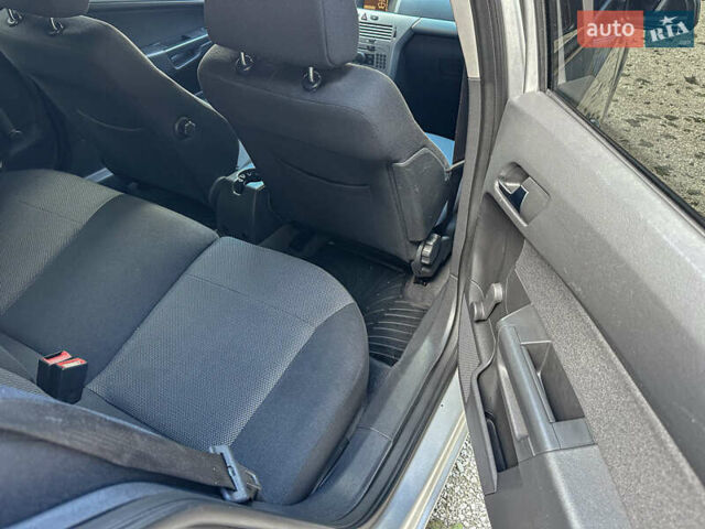 Серый Опель Астра, объемом двигателя 1.6 л и пробегом 210 тыс. км за 5500 $, фото 98 на Automoto.ua