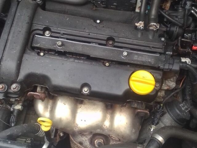 Серый Опель Астра, объемом двигателя 1.4 л и пробегом 225 тыс. км за 4000 $, фото 6 на Automoto.ua