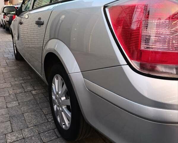 Серый Опель Астра, объемом двигателя 1.6 л и пробегом 207 тыс. км за 5800 $, фото 11 на Automoto.ua