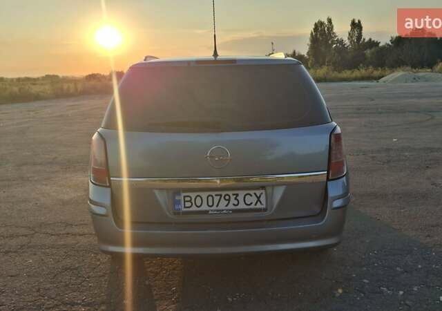 Серый Опель Астра, объемом двигателя 1.6 л и пробегом 208 тыс. км за 5900 $, фото 6 на Automoto.ua