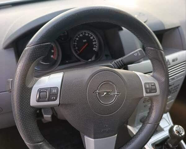 Серый Опель Астра, объемом двигателя 1.6 л и пробегом 207 тыс. км за 5800 $, фото 65 на Automoto.ua