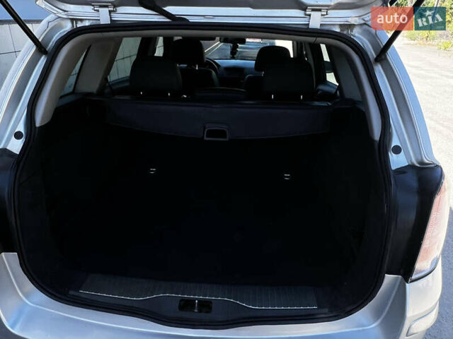 Серый Опель Астра, объемом двигателя 1.6 л и пробегом 276 тыс. км за 5500 $, фото 11 на Automoto.ua