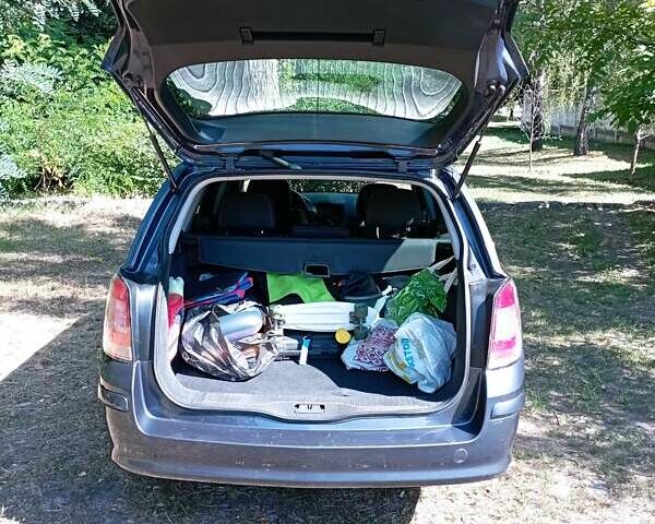 Серый Опель Астра, объемом двигателя 1.6 л и пробегом 221 тыс. км за 5300 $, фото 9 на Automoto.ua