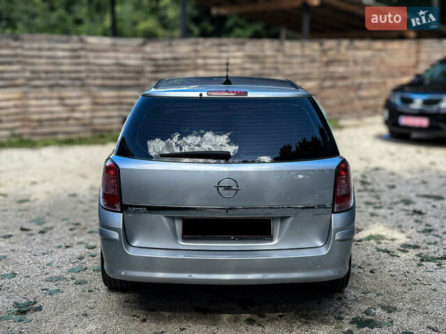 Серый Опель Астра, объемом двигателя 1.6 л и пробегом 210 тыс. км за 5500 $, фото 18 на Automoto.ua