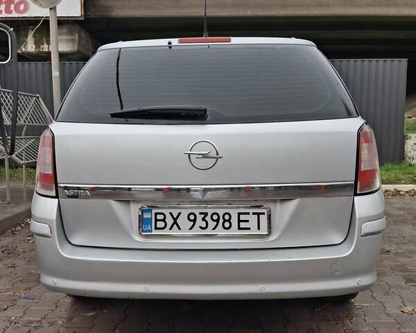 Серый Опель Астра, объемом двигателя 1.6 л и пробегом 290 тыс. км за 5450 $, фото 6 на Automoto.ua