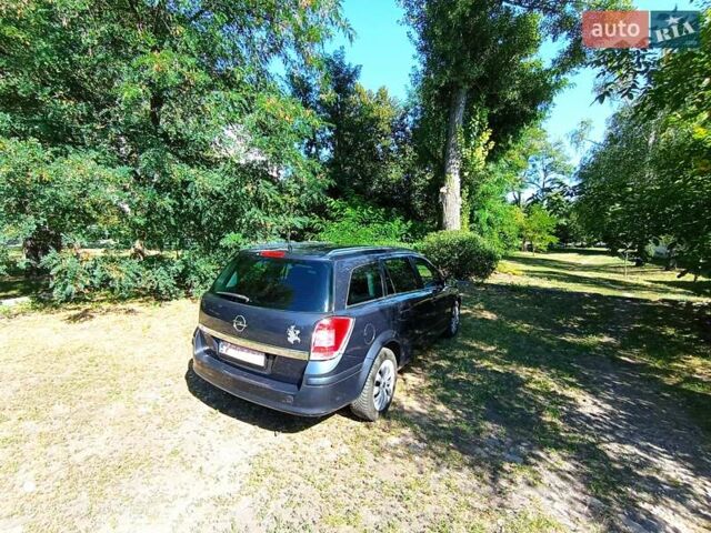 Серый Опель Астра, объемом двигателя 1.6 л и пробегом 221 тыс. км за 5300 $, фото 16 на Automoto.ua