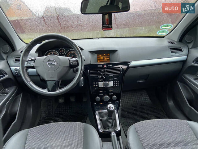 Серый Опель Астра, объемом двигателя 1.6 л и пробегом 232 тыс. км за 5650 $, фото 12 на Automoto.ua