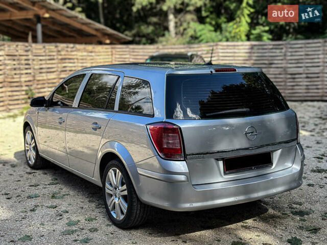 Серый Опель Астра, объемом двигателя 1.6 л и пробегом 210 тыс. км за 5500 $, фото 15 на Automoto.ua