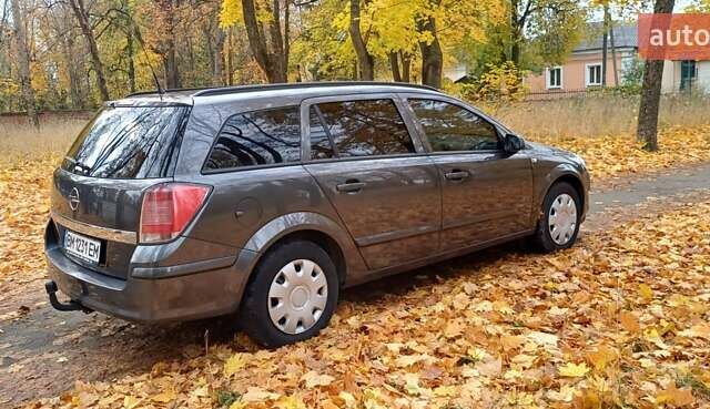 Опель Астра 2009 у Глухове на Automoto.ua Сірий Опель Астра, об'ємом двигуна 1.6 л та пробігом 255 тис. км за 5500 $, фото 1 на Automoto.ua