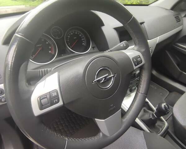 Серый Опель Астра, объемом двигателя 1.6 л и пробегом 199 тыс. км за 5650 $, фото 26 на Automoto.ua