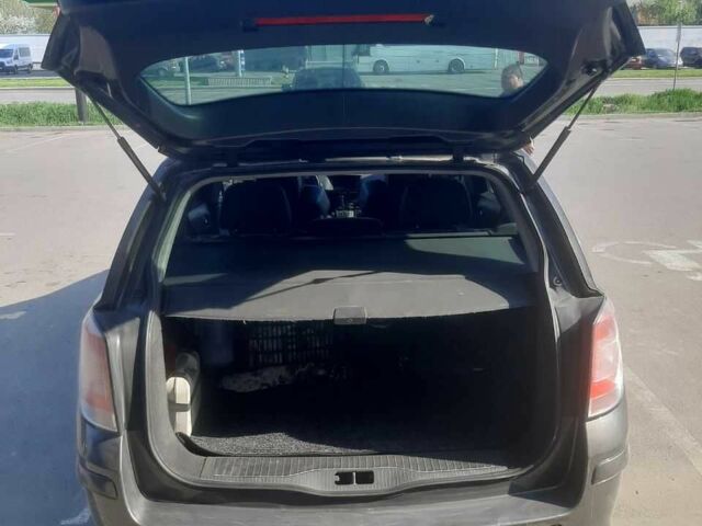 Серый Опель Астра, объемом двигателя 1.7 л и пробегом 320 тыс. км за 4900 $, фото 3 на Automoto.ua