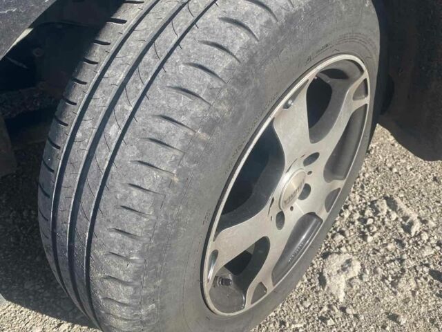 Серый Опель Астра, объемом двигателя 1.4 л и пробегом 216 тыс. км за 5700 $, фото 7 на Automoto.ua