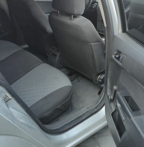 Серый Опель Астра, объемом двигателя 1 л и пробегом 303 тыс. км за 5500 $, фото 10 на Automoto.ua