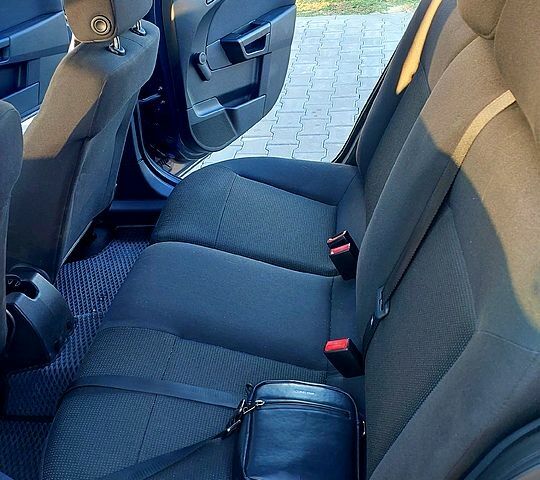 Серый Опель Астра, объемом двигателя 1.6 л и пробегом 236 тыс. км за 6000 $, фото 10 на Automoto.ua