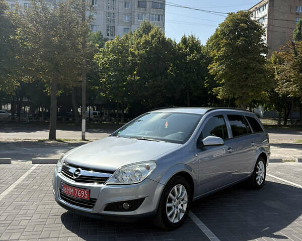 Серый Опель Астра, объемом двигателя 1.6 л и пробегом 194 тыс. км за 6100 $, фото 4 на Automoto.ua