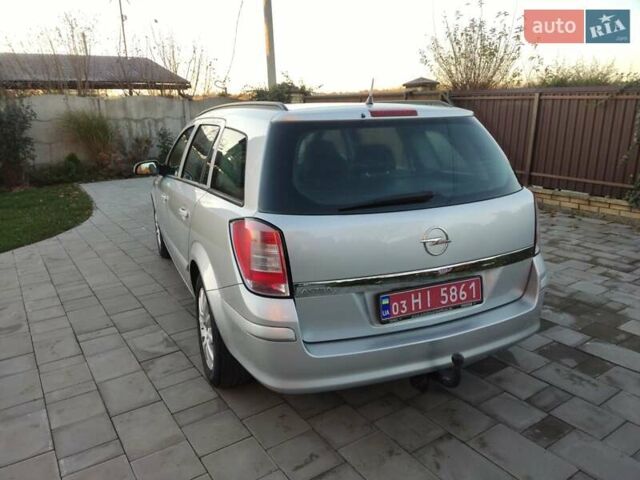 Серый Опель Астра, объемом двигателя 1.6 л и пробегом 240 тыс. км за 5550 $, фото 12 на Automoto.ua