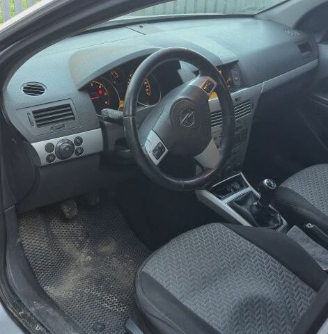 Серый Опель Астра, объемом двигателя 1 л и пробегом 303 тыс. км за 5500 $, фото 8 на Automoto.ua