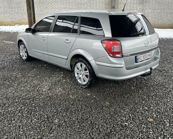 Серый Опель Астра, объемом двигателя 1.69 л и пробегом 314 тыс. км за 5700 $, фото 8 на Automoto.ua