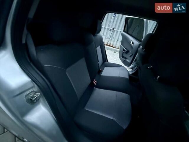 Серый Опель Астра, объемом двигателя 1.69 л и пробегом 252 тыс. км за 4999 $, фото 58 на Automoto.ua