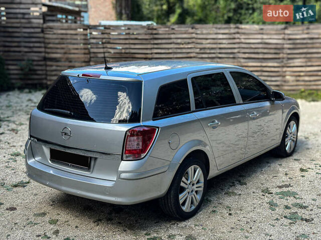 Серый Опель Астра, объемом двигателя 1.6 л и пробегом 210 тыс. км за 5500 $, фото 22 на Automoto.ua