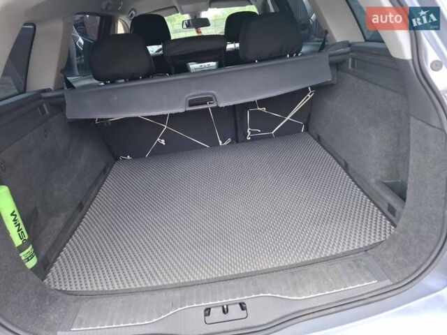 Серый Опель Астра, объемом двигателя 1.6 л и пробегом 189 тыс. км за 5900 $, фото 5 на Automoto.ua