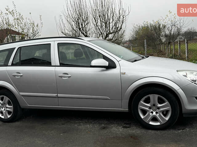 Серый Опель Астра, объемом двигателя 1.4 л и пробегом 199 тыс. км за 5350 $, фото 6 на Automoto.ua