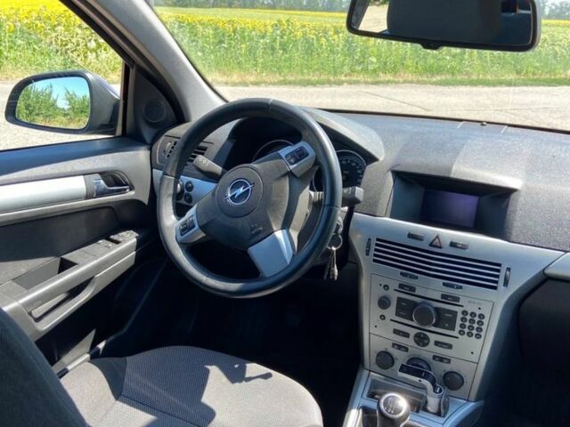 Серый Опель Астра, объемом двигателя 1.4 л и пробегом 213 тыс. км за 5800 $, фото 7 на Automoto.ua