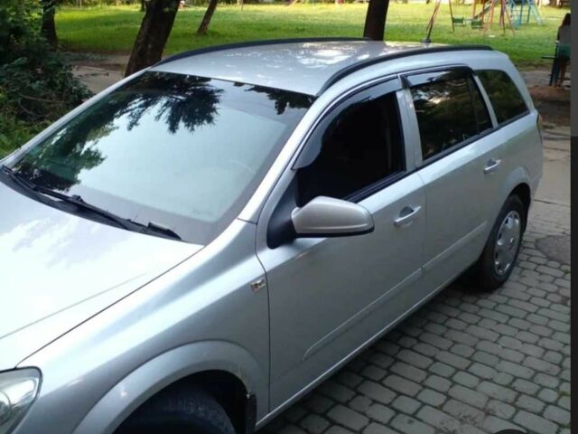 Серый Опель Астра, объемом двигателя 1.7 л и пробегом 267 тыс. км за 5000 $, фото 2 на Automoto.ua