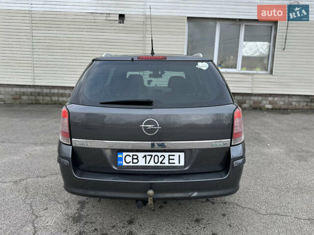 Серый Опель Астра, объемом двигателя 1.69 л и пробегом 300 тыс. км за 5500 $, фото 4 на Automoto.ua