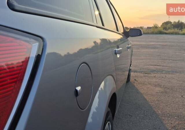 Серый Опель Астра, объемом двигателя 1.6 л и пробегом 208 тыс. км за 5900 $, фото 2 на Automoto.ua