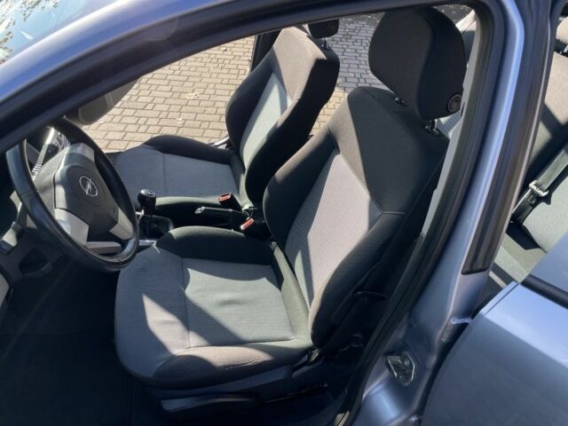 Серый Опель Астра, объемом двигателя 1.6 л и пробегом 228 тыс. км за 5500 $, фото 13 на Automoto.ua