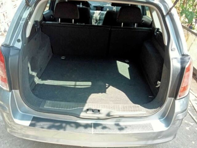 Серый Опель Астра, объемом двигателя 1.6 л и пробегом 237 тыс. км за 5300 $, фото 6 на Automoto.ua